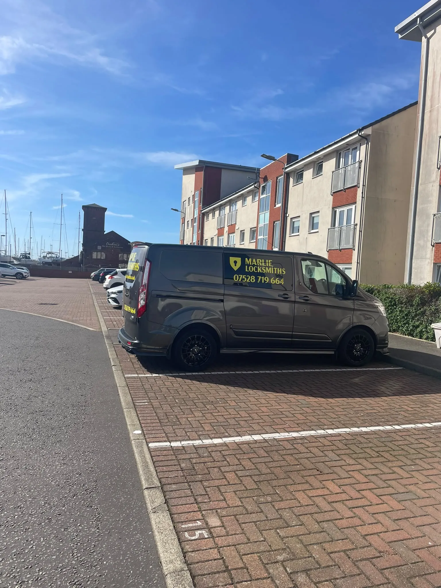 Marlie Locksmiths mobile emergency vehicle providing lock entry services in Irvine